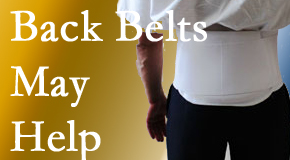 New York City back pain sufferers wearing back support belts are supported and reminded to move carefully while healing.