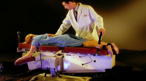 This is a picture of Cox Technic chiropratic spinal manipulation as performed at Rosenberg Wellness Center.