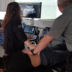 image New York City chiropractic ultrasound imaging of spinal vertebrae during treatment